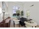 Stylish dining room with modern table, chairs, and sliding glass door to backyard pool at 134 Wentworth Dr, Henderson, NV 89074