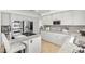Bright kitchen features granite countertops, white cabinets, and stainless steel appliances at 134 Wentworth Dr, Henderson, NV 89074