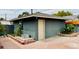View of additional building featuring brick accents in a backyard setting at 1801 Griffith Ave, Las Vegas, NV 89104
