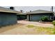 Open backyard space with brick accents and easy access between structures, offering a canvas for outdoor living at 1801 Griffith Ave, Las Vegas, NV 89104