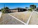 Southwest home with mature palms and modern architecture at 1801 Griffith Ave, Las Vegas, NV 89104
