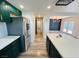 Modern kitchen with stainless steel appliances, updated countertops, and lots of cabinet space at 1801 Griffith Ave, Las Vegas, NV 89104