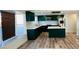 Bright kitchen with stainless steel appliances, breakfast bar, updated cabinets and countertops at 1801 Griffith Ave, Las Vegas, NV 89104