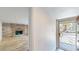 View of the living room featuring a brick fireplace and contemporary flooring at 1801 Griffith Ave, Las Vegas, NV 89104