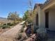 Charming front yard with desert landscaping and a brick walkway to the front door, great curb appeal at 2664 Frabiele St, Henderson, NV 89044