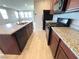 Granite countertops and stainless steel appliances in this well-appointed kitchen create an inviting cooking space at 2664 Frabiele St, Henderson, NV 89044