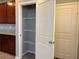 Well-organized pantry with shelving provides ample storage in this conveniently located space at 2664 Frabiele St, Henderson, NV 89044