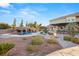 Spacious backyard with a custom pool, a waterfall, and landscaping at 6004 Chessington Ave, Las Vegas, NV 89131