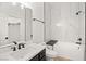 Modern bathroom featuring a tub, toilet, and modern vanity with a sink at 6004 Chessington Ave, Las Vegas, NV 89131
