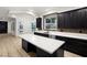 Kitchen featuring stainless steel appliances, an island, and designer tile backsplash at 6004 Chessington Ave, Las Vegas, NV 89131