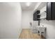 Functional laundry room with washer, dryer, and a sink at 6004 Chessington Ave, Las Vegas, NV 89131
