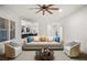 Stylish living room offers natural light, open-concept design, and hardwood floors at 6004 Chessington Ave, Las Vegas, NV 89131