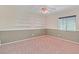 Bedroom with built-in shelves and a ceiling fan at 681 Peach Coral St, Las Vegas, NV 89183