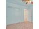 Neutral bedroom with closet and entry to the landing at 681 Peach Coral St, Las Vegas, NV 89183