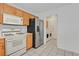 A kitchen with wooden cabinets and stainless steel appliances at 681 Peach Coral St, Las Vegas, NV 89183