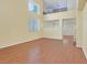 Open-concept living area with high ceilings and hardwood floors ready for personalization at 681 Peach Coral St, Las Vegas, NV 89183