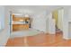 Bright living room featuring a kitchen, and hardwood floors at 681 Peach Coral St, Las Vegas, NV 89183