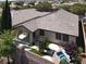 Aerial view of the home, highlighting the backyard oasis and the tile roof at 7806 Sundial Peak St, Las Vegas, NV 89166