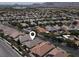 Aerial view of a neighborhood with single-Gathering homes, highlighting the property's location near Huckleberry Park at 7806 Sundial Peak St, Las Vegas, NV 89166