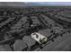 An aerial view of a home with newly installed solar panels in a residential community at 7806 Sundial Peak St, Las Vegas, NV 89166