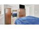 Bedroom featuring a ceiling fan, closet, TV, and wooden dresser at 7806 Sundial Peak St, Las Vegas, NV 89166