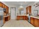 Functional kitchen features ample cabinet space, modern appliances, and a convenient sink area for easy meal prep at 7806 Sundial Peak St, Las Vegas, NV 89166