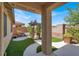 Enjoy the backyard with a pergola and a spa, accessible from the covered patio at 7806 Sundial Peak St, Las Vegas, NV 89166