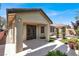 Covered patio featuring an outdoor seating area and beautiful views at 7806 Sundial Peak St, Las Vegas, NV 89166