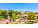 Community playground area with slides and green space provides a fun outdoor activity space at 7806 Sundial Peak St, Las Vegas, NV 89166