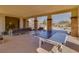 Spacious recreation area features a ping pong table and comfortable seating, perfect for entertaining guests at 7806 Sundial Peak St, Las Vegas, NV 89166