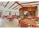 Spacious room features beamed ceilings, paneled walls, and ample seating for community gatherings at 7806 Sundial Peak St, Las Vegas, NV 89166