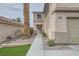 Charming two-story home with drought-resistant landscaping and stucco siding at 7829 Lovely Pine Pl, Las Vegas, NV 89143