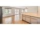 Open floor plan showcases the living room connected to the kitchen and backyard at 7829 Lovely Pine Pl, Las Vegas, NV 89143