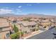 A beautiful neighborhood with solar panels and picturesque mountain views under a sunny blue sky at 7865 Solid Horn Ct, Las Vegas, NV 89149
