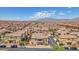 A sprawling neighborhood with solar panels and stunning mountain views on the horizon at 7865 Solid Horn Ct, Las Vegas, NV 89149