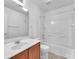 This bathroom features a tub/shower combo, a vanity, and updated fixtures at 7865 Solid Horn Ct, Las Vegas, NV 89149