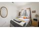 Bright bedroom featuring a comfortable bed, soft lighting, and decorative touches, perfect for relaxation at 9021 Canyon Magic Ave, Las Vegas, NV 89129