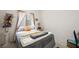Cozy bedroom with unique decorations and comfortable bedding for a relaxing retreat at 9021 Canyon Magic Ave, Las Vegas, NV 89129