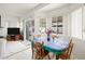 Cozy dining area with backyard access and natural light, next to the kitchen at 9021 Canyon Magic Ave, Las Vegas, NV 89129