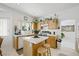 Bright and sunny kitchen with an island and oak cabinets at 9021 Canyon Magic Ave, Las Vegas, NV 89129