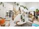 Elegant living room with high ceilings, ornate staircase, and beautiful decor create an elegant entrance at 9021 Canyon Magic Ave, Las Vegas, NV 89129