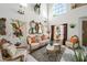 Elegant living room with high ceilings, ornate furniture, and an abundance of natural light at 9021 Canyon Magic Ave, Las Vegas, NV 89129