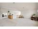 Open loft space with plush carpeting, stylish furnishings, and versatile layout, perfect for relaxation at 9021 Canyon Magic Ave, Las Vegas, NV 89129