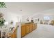 Bright loft area with plush carpeting, custom cabinetry, and stylish decor, ideal for versatile living at 9021 Canyon Magic Ave, Las Vegas, NV 89129