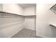 Walk-in closet with shelving and carpet at 11640 Desert Hollow Ave, Las Vegas, NV 89138
