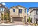 Charming two-story home with a two-car garage and beautifully landscaped front yard in a well-maintained community at 11640 Desert Hollow Ave, Las Vegas, NV 89138