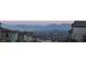 Panoramic view of mountains and the city from this neighborhood setting at 11640 Desert Hollow Ave, Las Vegas, NV 89138