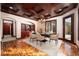Dining room featuring custom flooring, trim, and a built-in china cabinet at 1800 Melfi Ct, Henderson, NV 89012