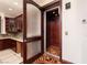 Interior elevator with wood paneling and custom flooring at 1800 Melfi Ct, Henderson, NV 89012