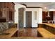 Gourmet kitchen boasts granite counters, mosaic backsplash, and custom cabinetry for a luxurious cooking experience at 1800 Melfi Ct, Henderson, NV 89012
